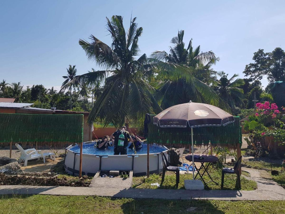 Nirvana Resort & Dive Centre - โมอัลโบอัล ภายนอก รูปภาพ